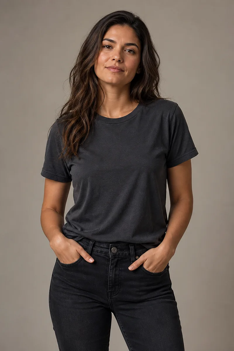 Fictional adult in a charcoal T-shirt before a controlled clothing edit