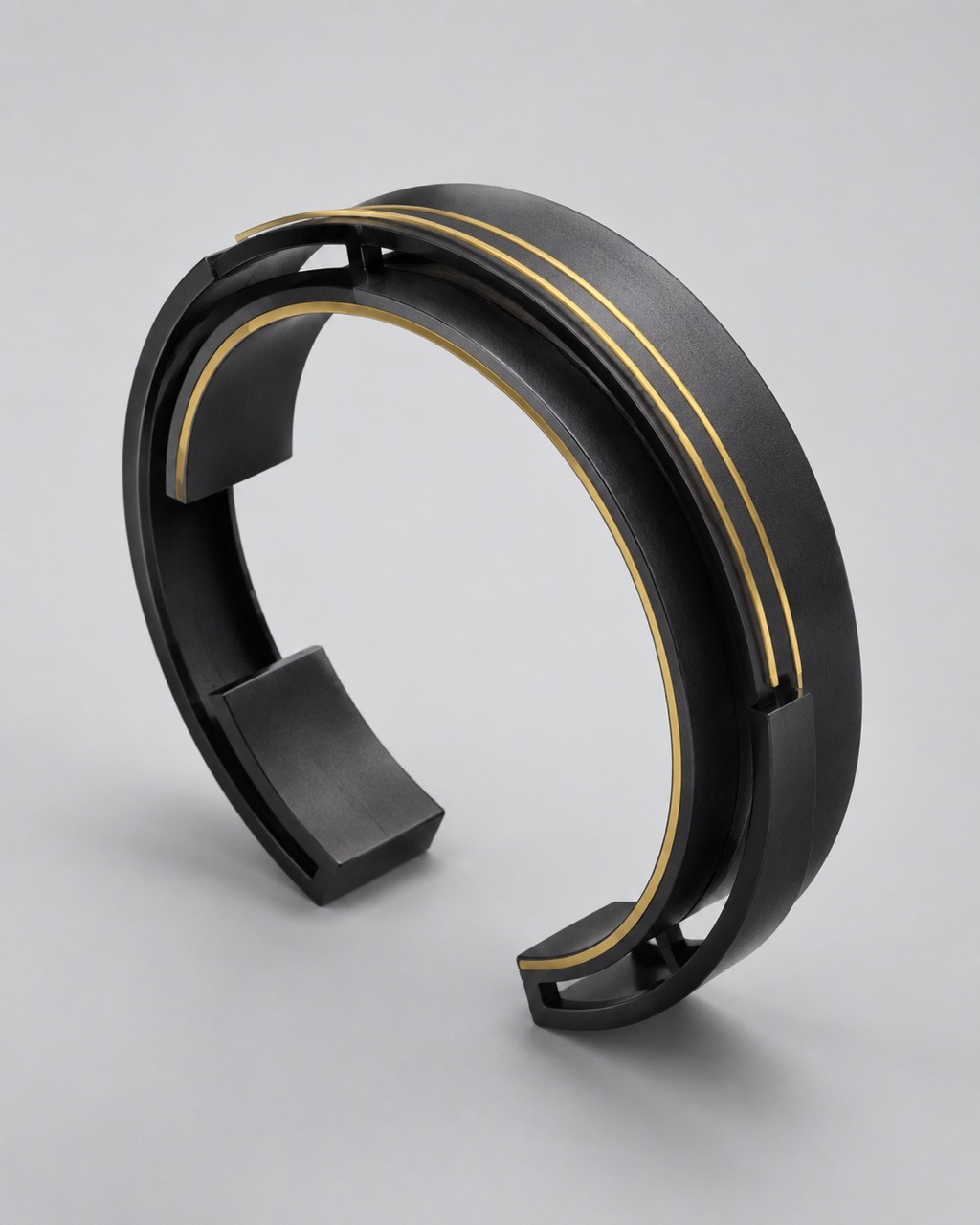 Geometric titanium cuff concept with complete opening and visible material joins