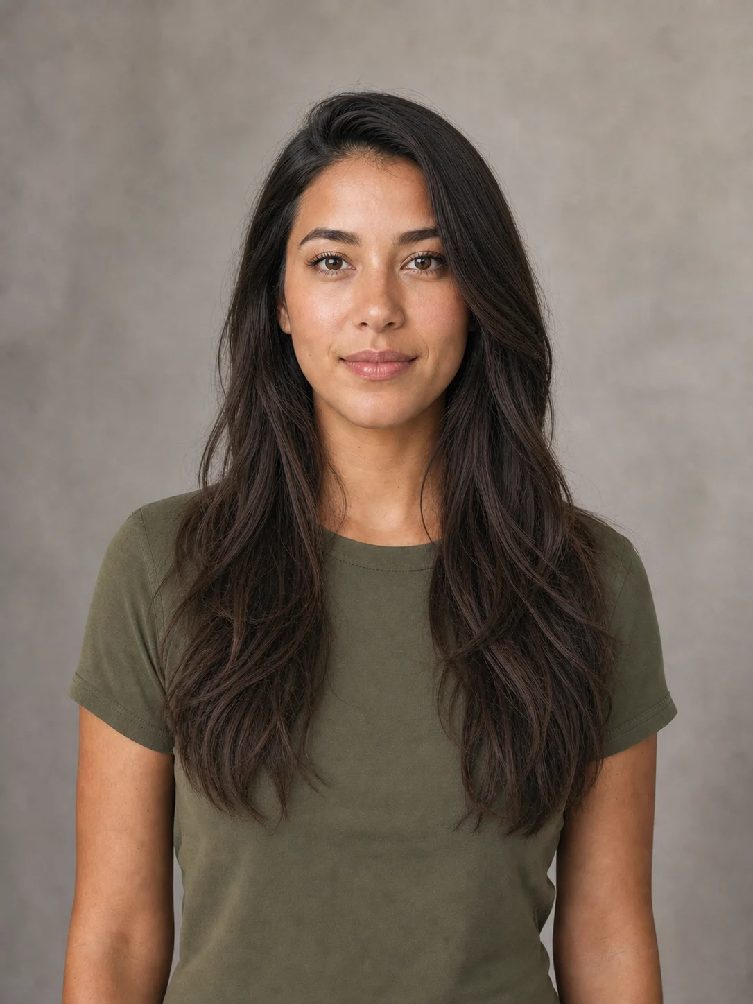 Same fictional portrait with natural long dark waves after AI hairstyle editing