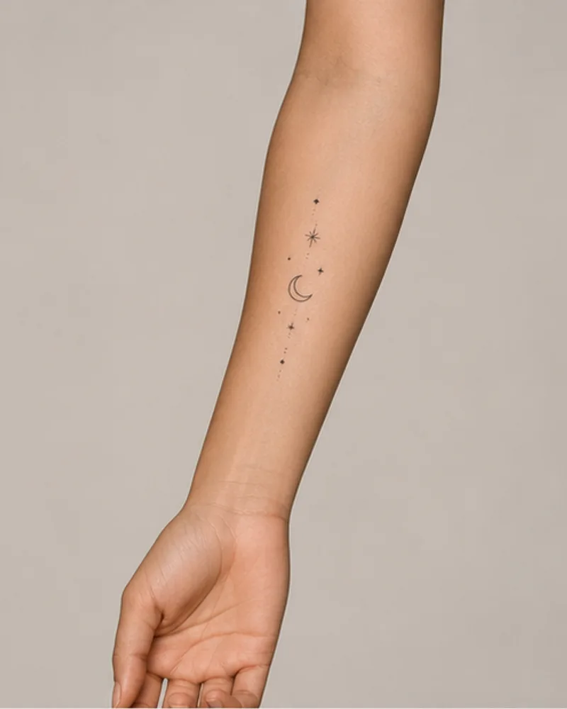 Minimal celestial virtual tattoo on an adult forearm