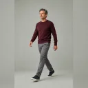 Fictional adult demonstrating a walking stride with visible weight transfer