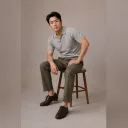 Fictional adult demonstrating a forward seated lean with planted feet