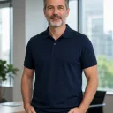 Fictional mature adult in a casual office outfit before changing to a charcoal suit
