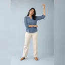 Fictional adult demonstrating a raised arm, crossed forearm, and tilted shoulder pose