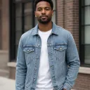 Fictional adult in a denim jacket before changing to an olive bomber