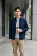 Cropped fictional adult portrait on a city walkway