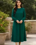 Fictional adult wearing an emerald dress after an AI outfit replacement