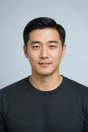Fictional adult portrait with short straight hair before a short curl preview