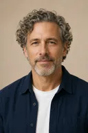 Mature portrait preview with natural salt-and-pepper curls